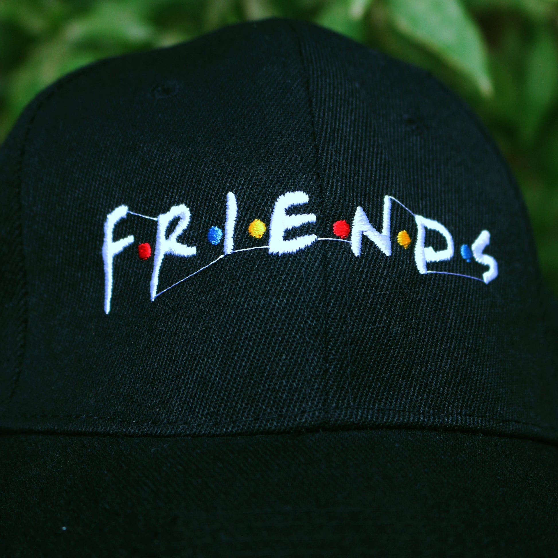 black friends cap details